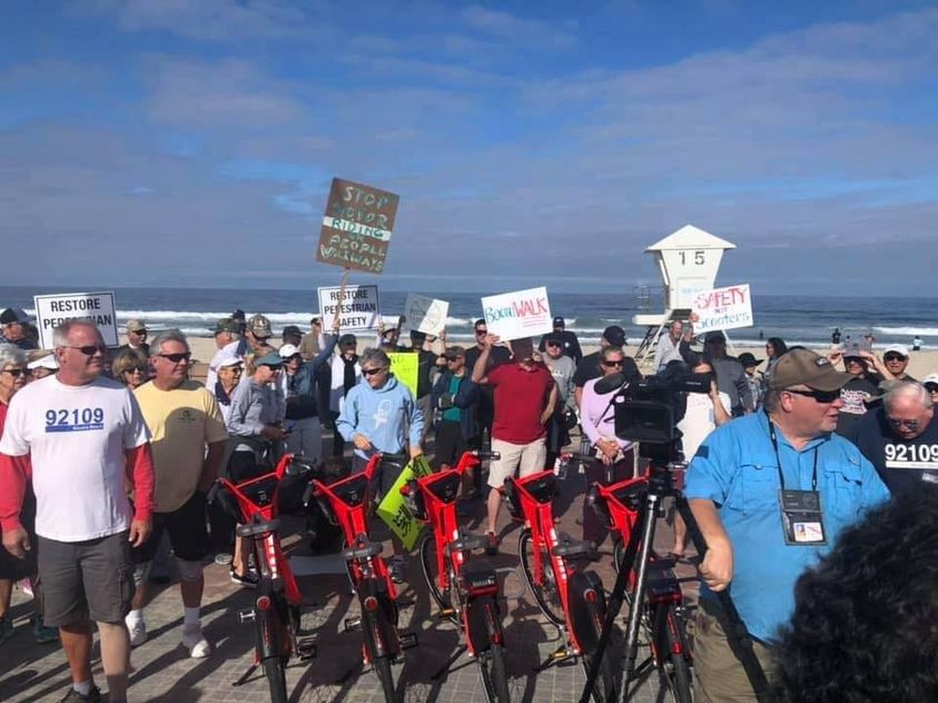 Residents of Pacific Beach and Mission Beach protest the mayhem created by motorized rental vehicles on the boardwalk.